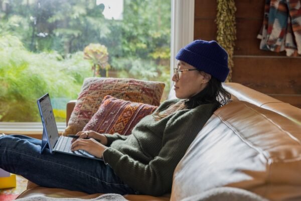 A woman searching for a knowledge management company that enhances efficiency through knowledge sharing